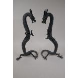 A pair of Chinese bronze figures of dragons, 16" high