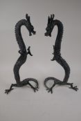 A pair of Chinese bronze figures of dragons, 16" high