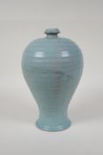 A Chinese Ru ware style ribbed porcelain vase, chased character inscription to base, 10" high, AF