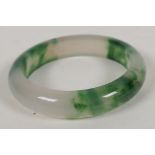 A two colour jade bangle, 2" diameter