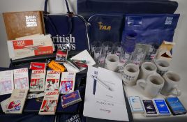 A collection of airline memorabilia including BA Concorde stationary set, BA and TAA bags, Lufthansa