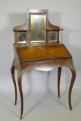 A C19th inlaid rosewood bureau de dame, with ormolu mounts, fall front and fitted interior, 31" x