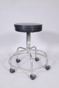 An industrial tubular metal push stool, 20" diameter, 24" high