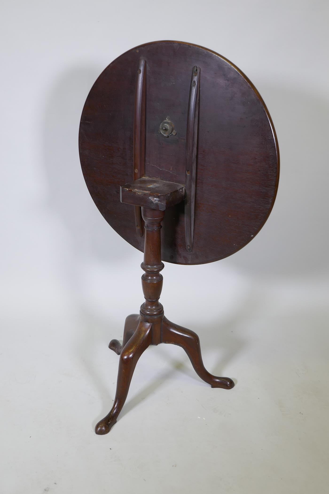 A Georgian mahogany tilt top occasional table on tripod supports, 29" high, 27" diameter - Image 3 of 4