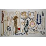 A quantity of vintage costume jewellery, mostly necklaces