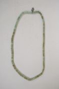 A green jade bead necklace, 27" long