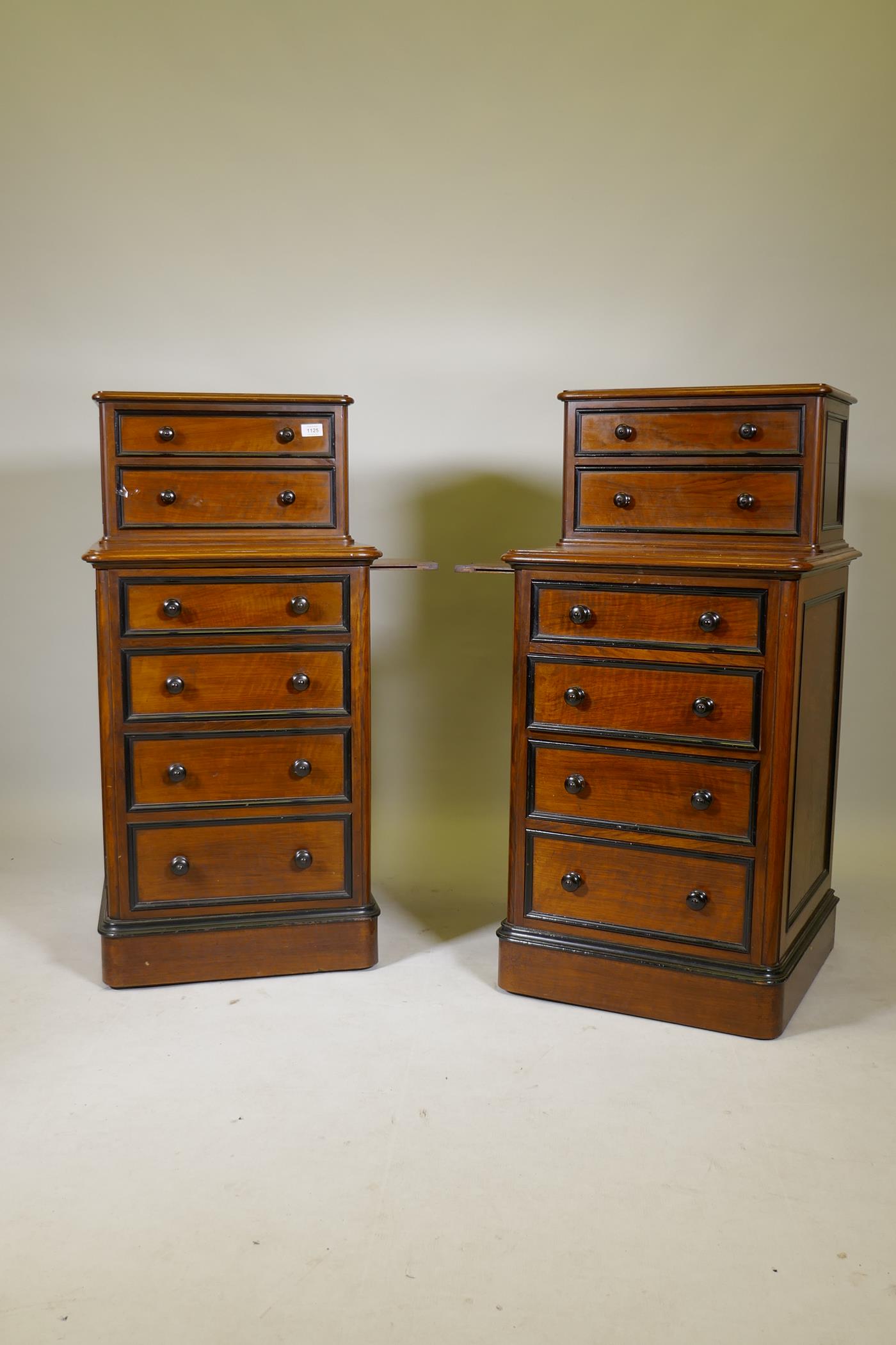 A pair of C19th walnut cabinets with ebony mouldings, one with six drawers, the other two drawers