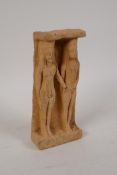 An antique Greek/Anatolian terracotta plaque depicting a man and woman, 3½" x 8"