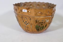 An Arts & Crafts copper planter with applied and pierced decoration, 16" diameter, 10" high