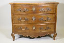 A late C19th French walnut serpentine front commode, with three drawers and moulded panel ends,