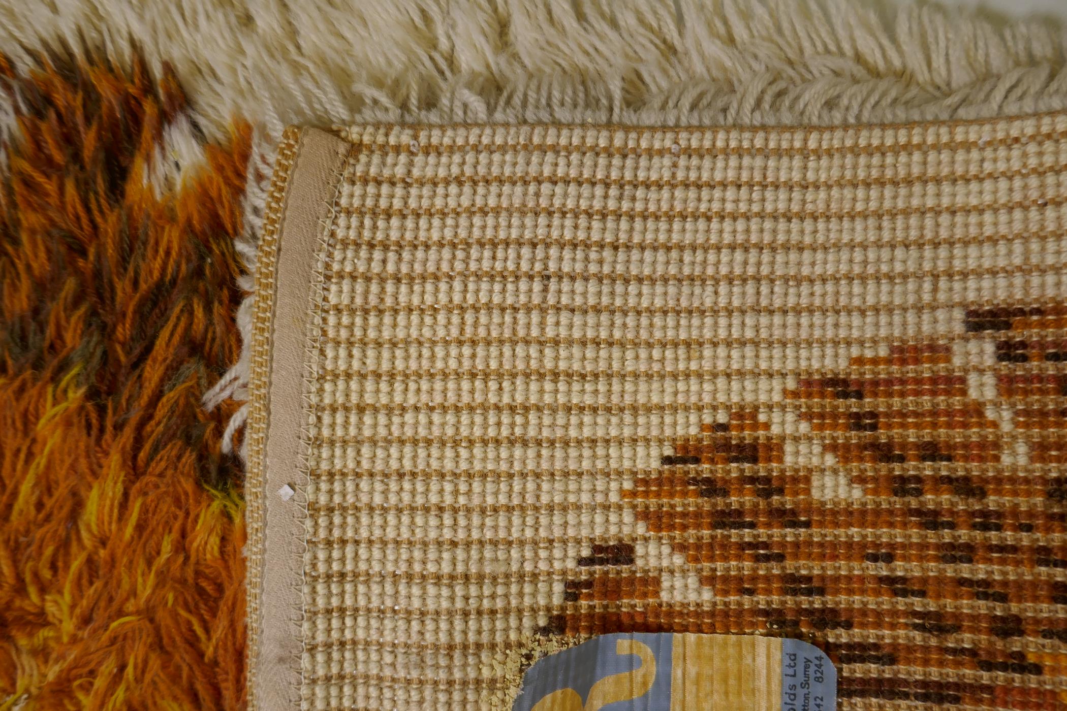 A 1970s cream ground shagpile Norsk rug, with a sunburst medallion design, 48" x 26" - Image 4 of 4