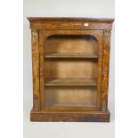 A Victorian inlaid walnut pier cabinet with ormolu mounts and single door, 35" x 14" x 43"