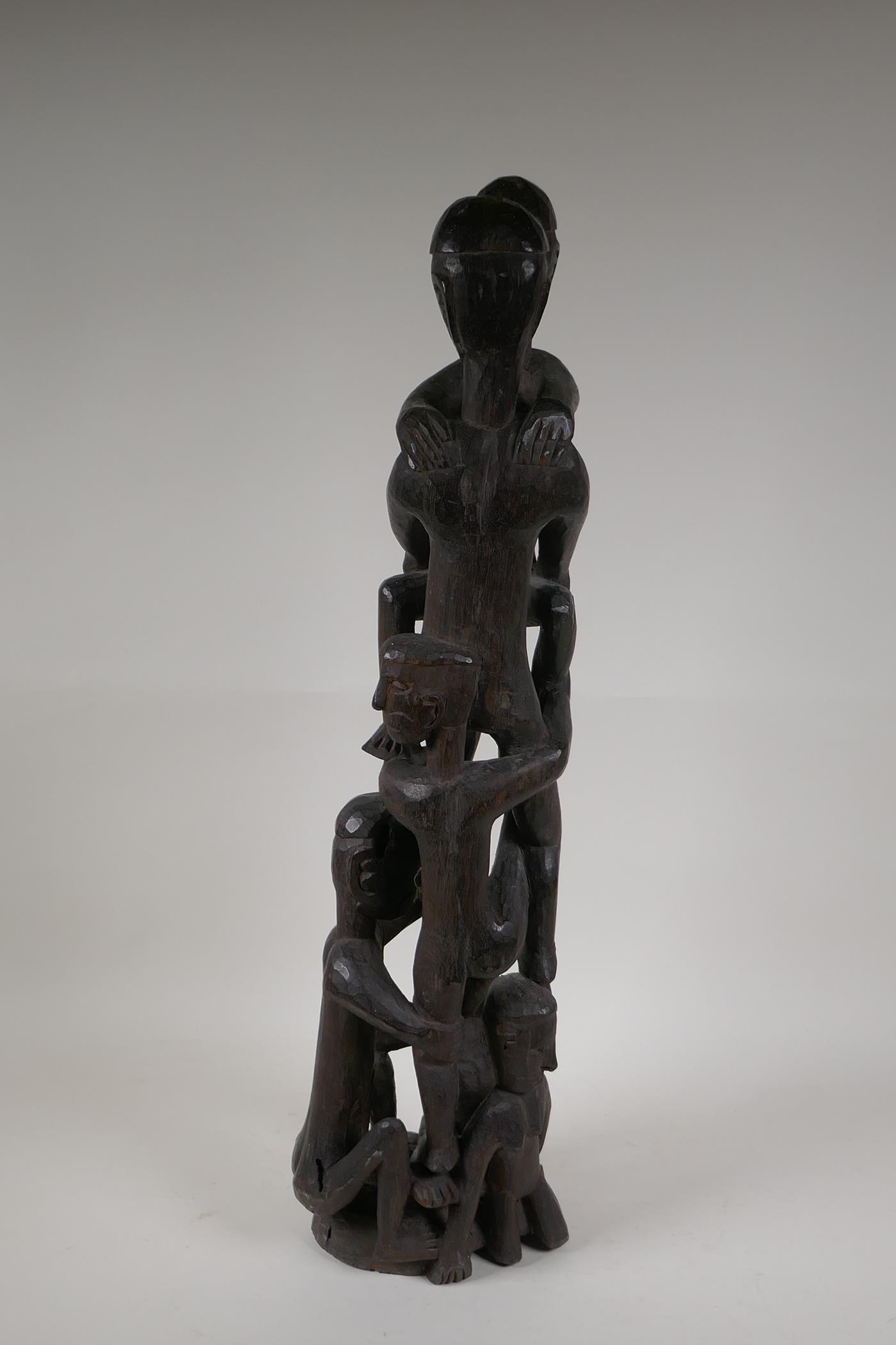 A Philippino Ifugao carved hardwood figure group, 26" high - Image 3 of 8