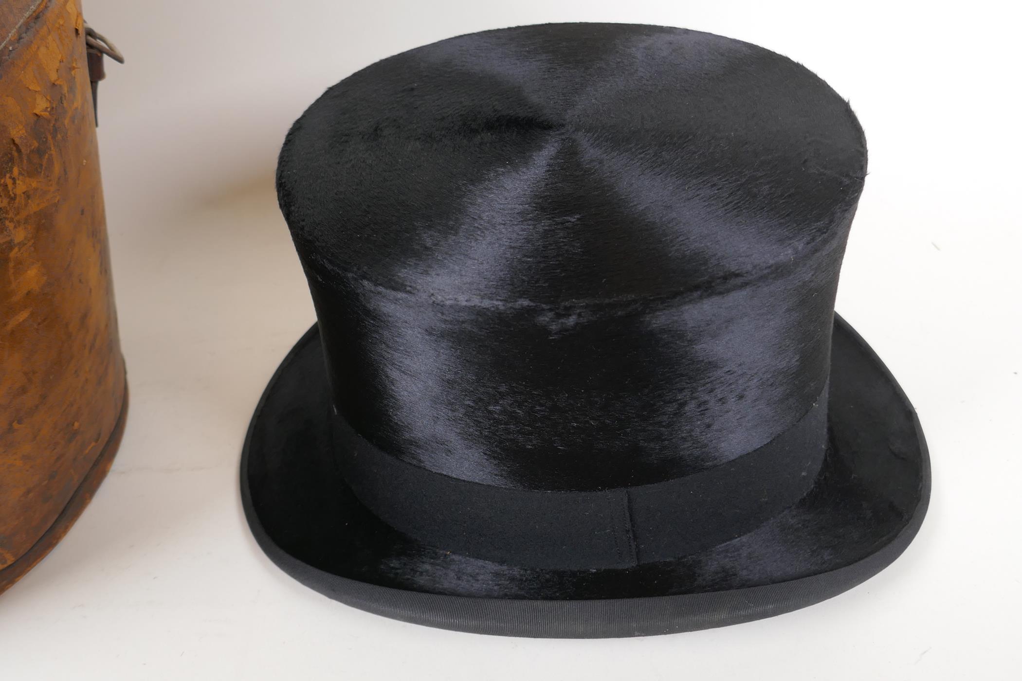 A silk top hat by Henry Heath Ltd in a leather fitted hat box - Image 5 of 7