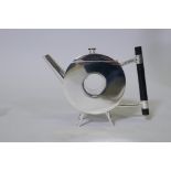 A Christopher Dresser style silver plated teapot, 6" high