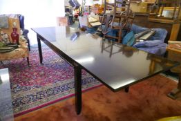 An Italian 'Selva' extending dining table with two leaves, 126" x 39", 31" high extended