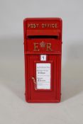 A painted cast iron replica post box, 10" x 14½", 23½" high