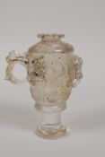 A Chinese moulded glass libation cup and cover, with raised kylin decoration, 4½" high