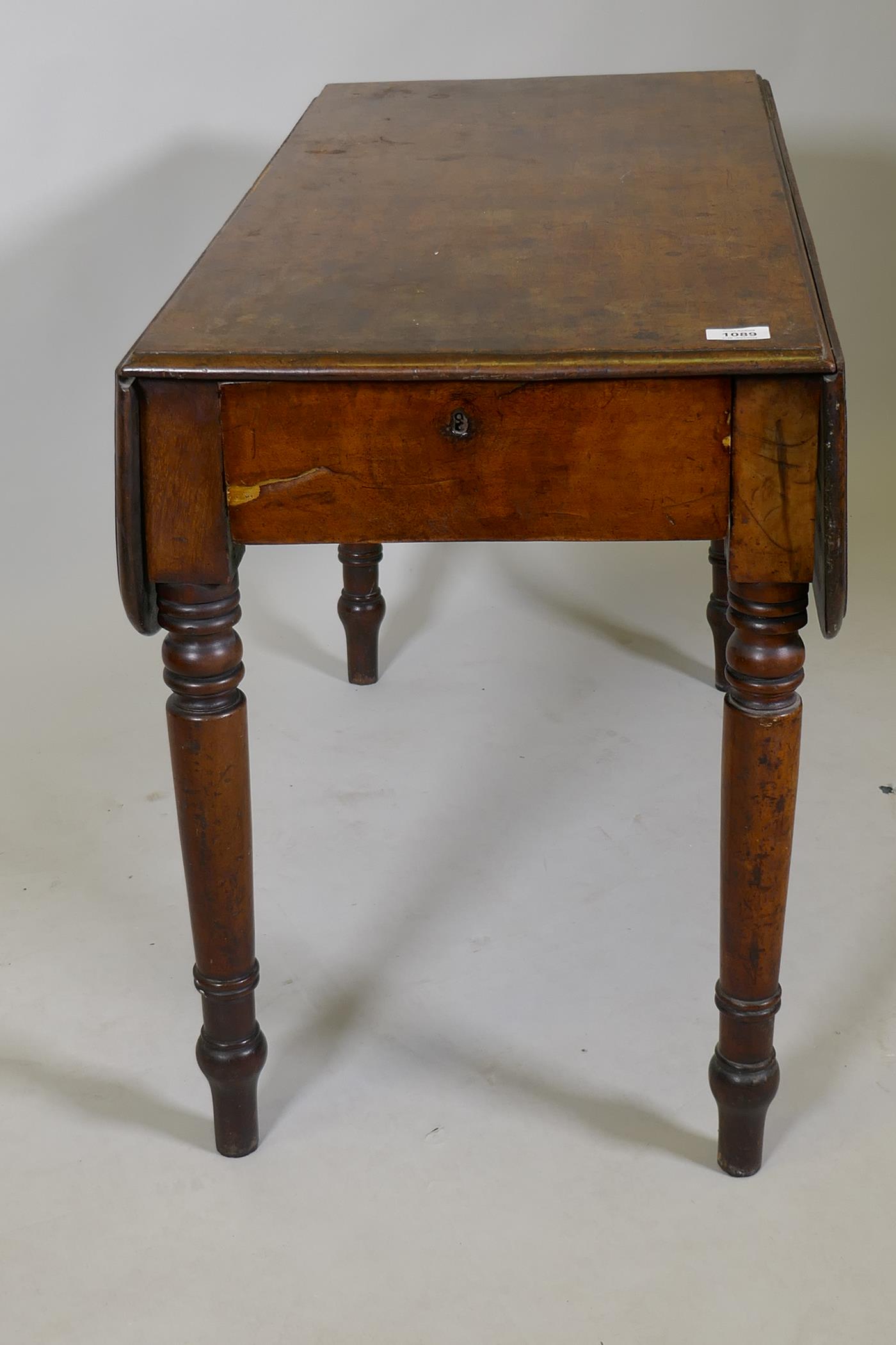 A C19th mahogany twin flap Pembroke table with single end drawer on ring turned supports, 25½" x 35" - Image 2 of 2