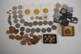 A quantity of coins including two 1996 World Cup football £2 coins, an American 1979 Susan B.