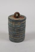 A Chinese fused bronze coin stack scroll weight, 2" high