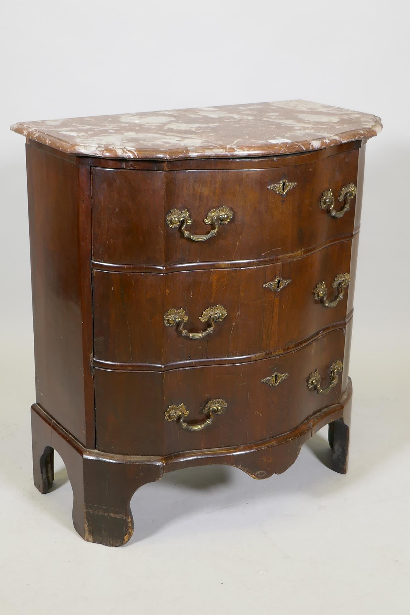 An antique mahogany veneered commode, with marble top and shaped front and three drawers with ormolu - Image 2 of 4