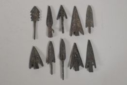 Ten archaic style bronze arrow heads, 3" longest