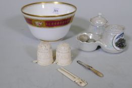 A porcelain bowl with gilt and hand painted decoration, a souvenir of Jersey cruet, a salt pepper