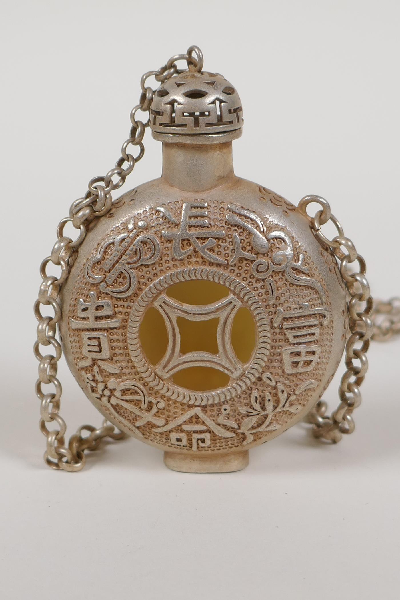 A Chinese white metal scent holder bottle on chain, set with a celadon hardstone panel depicting - Image 2 of 2