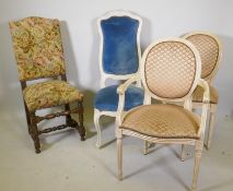 A French high back painted hall chair, a French elbow chair on reeded turned supports, a matching