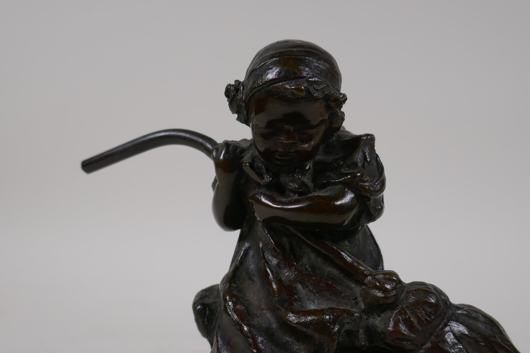 An Italian bronze figure of a young girl sweeping, signed E. Simone (Edgardo Simone), stamped ' - Image 2 of 8