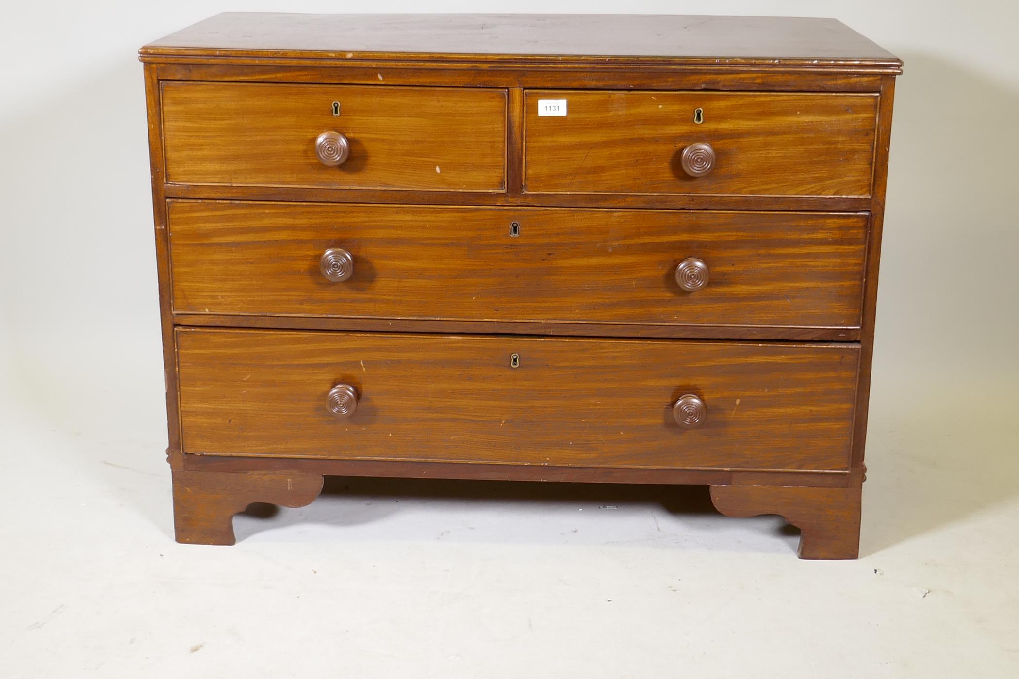 A C19th mahogany chest of two over two drawers, raised on bracket supports, 41" x 20" x 30"
