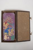 A Chinese mauve ground ink stone decorated with farming figures highlighted in gilt, boxed, 4½" x