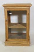 A glazed hardwood side cabinet, 22" x 19", 32" high