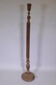 An Indian carved hardwood standard lamp base, 59" high