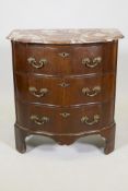 An antique mahogany veneered commode, with marble top and shaped front and three drawers with ormolu