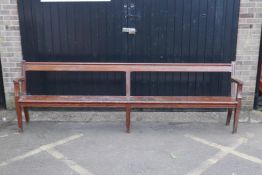 A Victorian pitch pine pew/long bench, 118" long