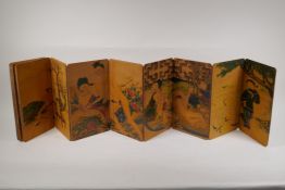 A Chinese printed concertina book depicting erotic scenes, 6" x 11"