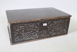 An late C17th/early C18th oak bible box with carved front, initialed G.B., 26" x 18" x 9"