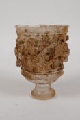 A Chinese moulded glass/crystal goblet with raised kylin decoration, 3" diameter