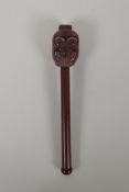 A Japanese carved hardwood Noh mask incense holder, signed, 10½" long