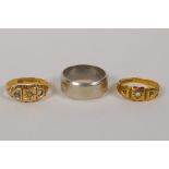 An 18ct yellow gold ring, 2.3g gross, and two 9ct gold rings, 9g gross