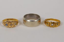 An 18ct yellow gold ring, 2.3g gross, and two 9ct gold rings, 9g gross