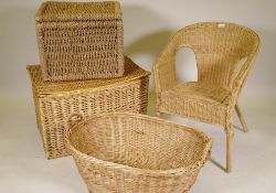 A wicker laundry basket, 28" x 20" x 20", two more baskets and a chair