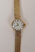 A 9ct gold Certina lady's cocktail watch and strap, 25g gross