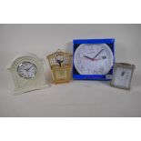 A mid C20th bird song automaton alarm clock, a porcelain cased quartz mantel clock, a silver