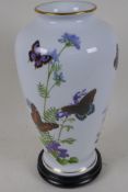 A Franklin porcelain vase, 'Meadowland Butterflies', by John Wilkinson, 12" high