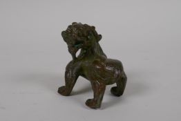 A Chinese bronze dragon, 2½" high
