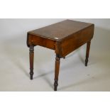 A C19th mahogany twin flap Pembroke table with single end drawer on ring turned supports, 25½" x 35"