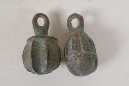 A pair of Chinese bronze scroll weights in the form of gourds, 2½" long